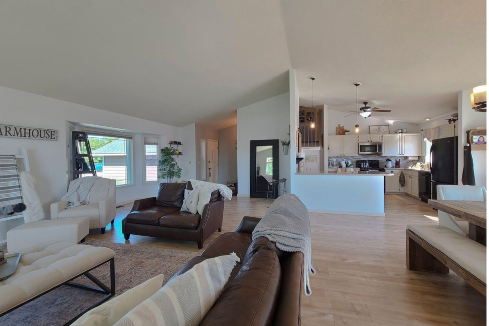 Open concept living room with luxury vinyl flooring